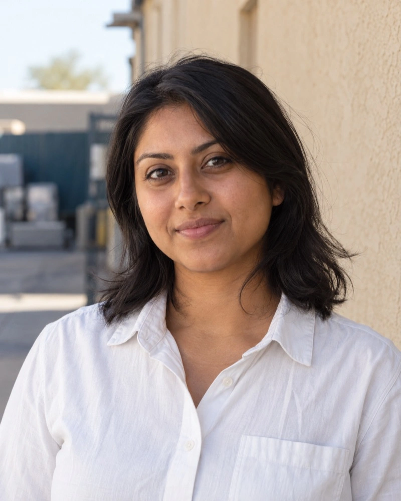 Portrait of Priya Mercer, a fictional Rillstead team member.